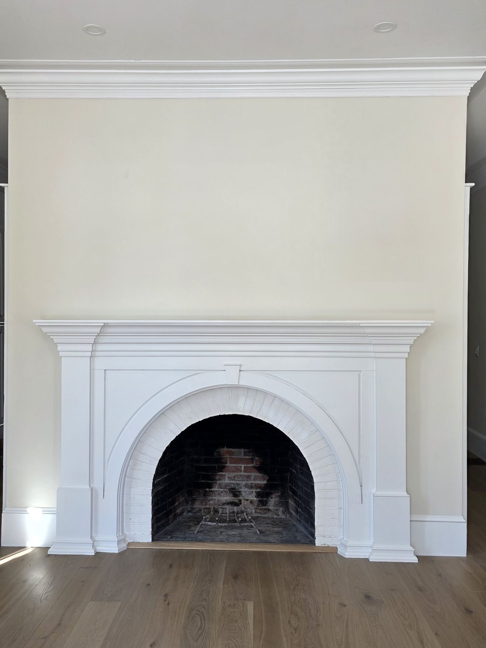 Arched fireplace mantel