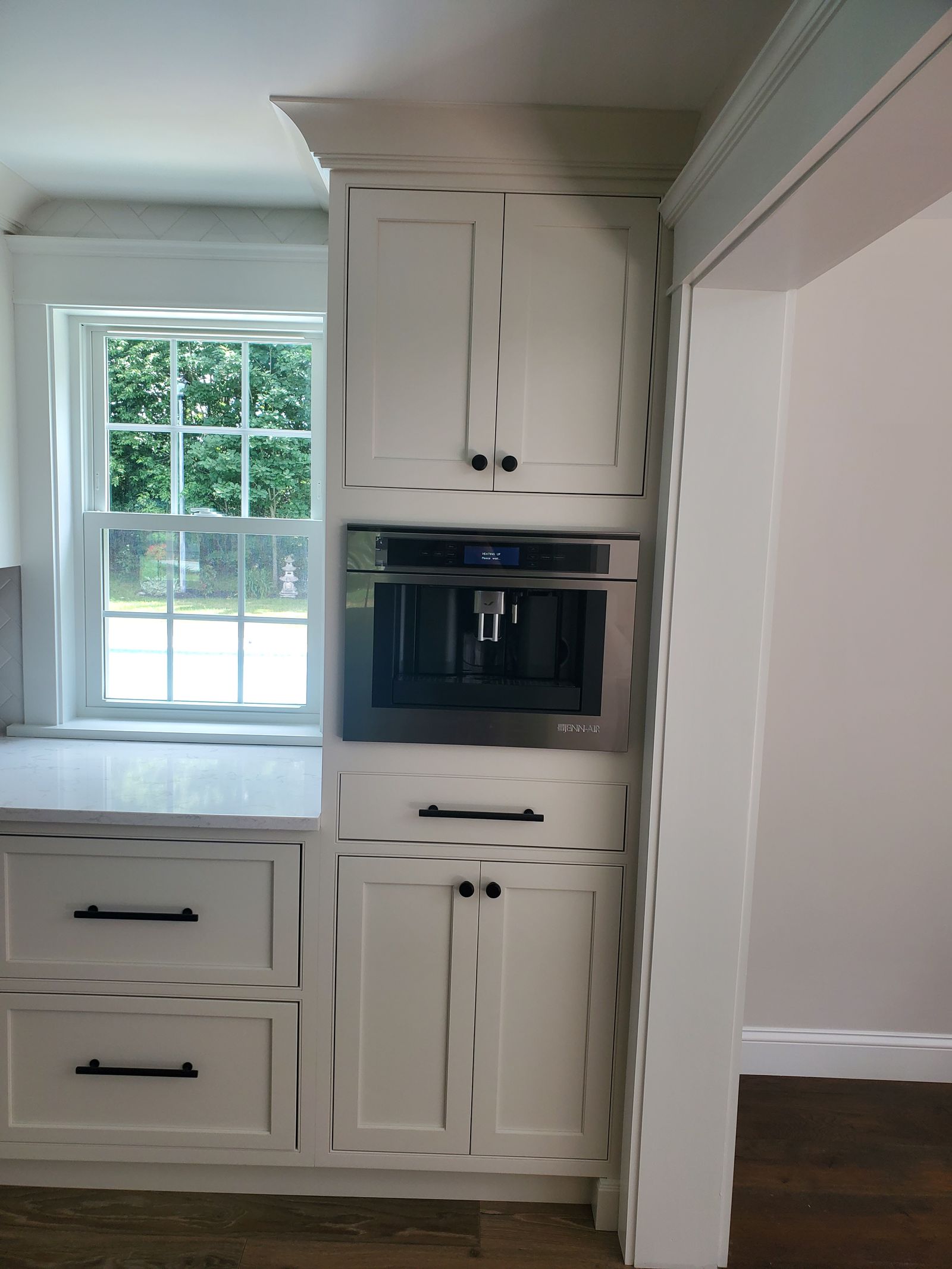 Built-in coffee station in inset cabinetry