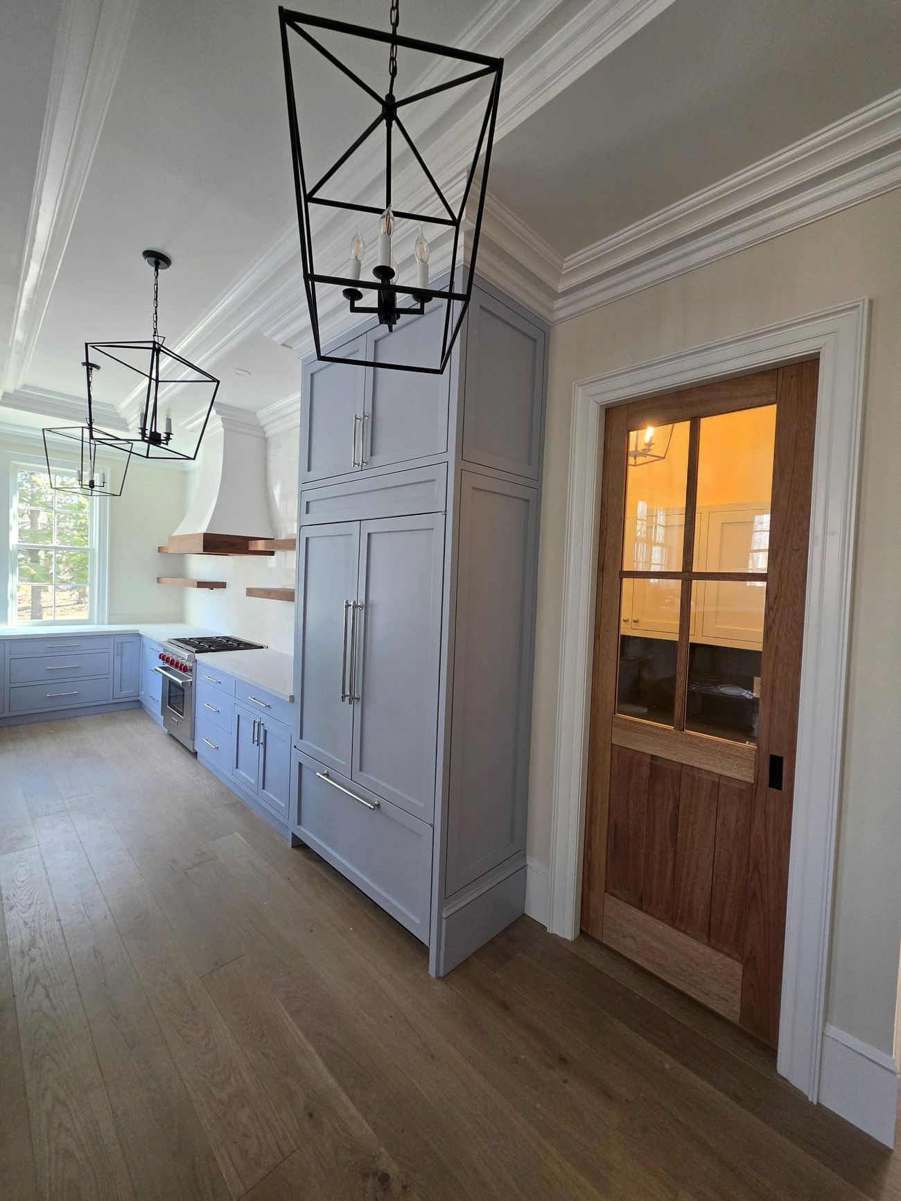 Kitchen with walnut pantry door