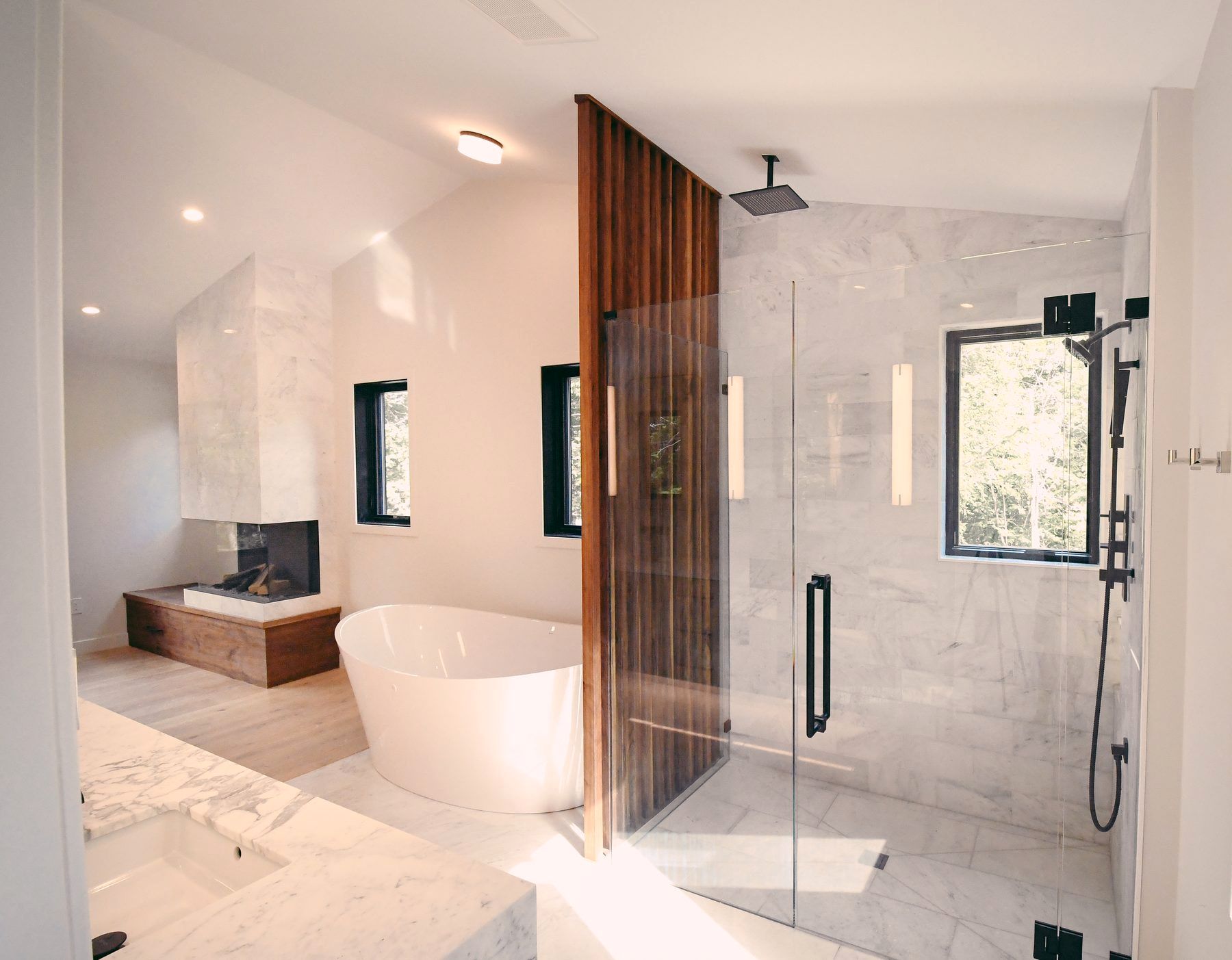 Primary bath with walnut slat wall