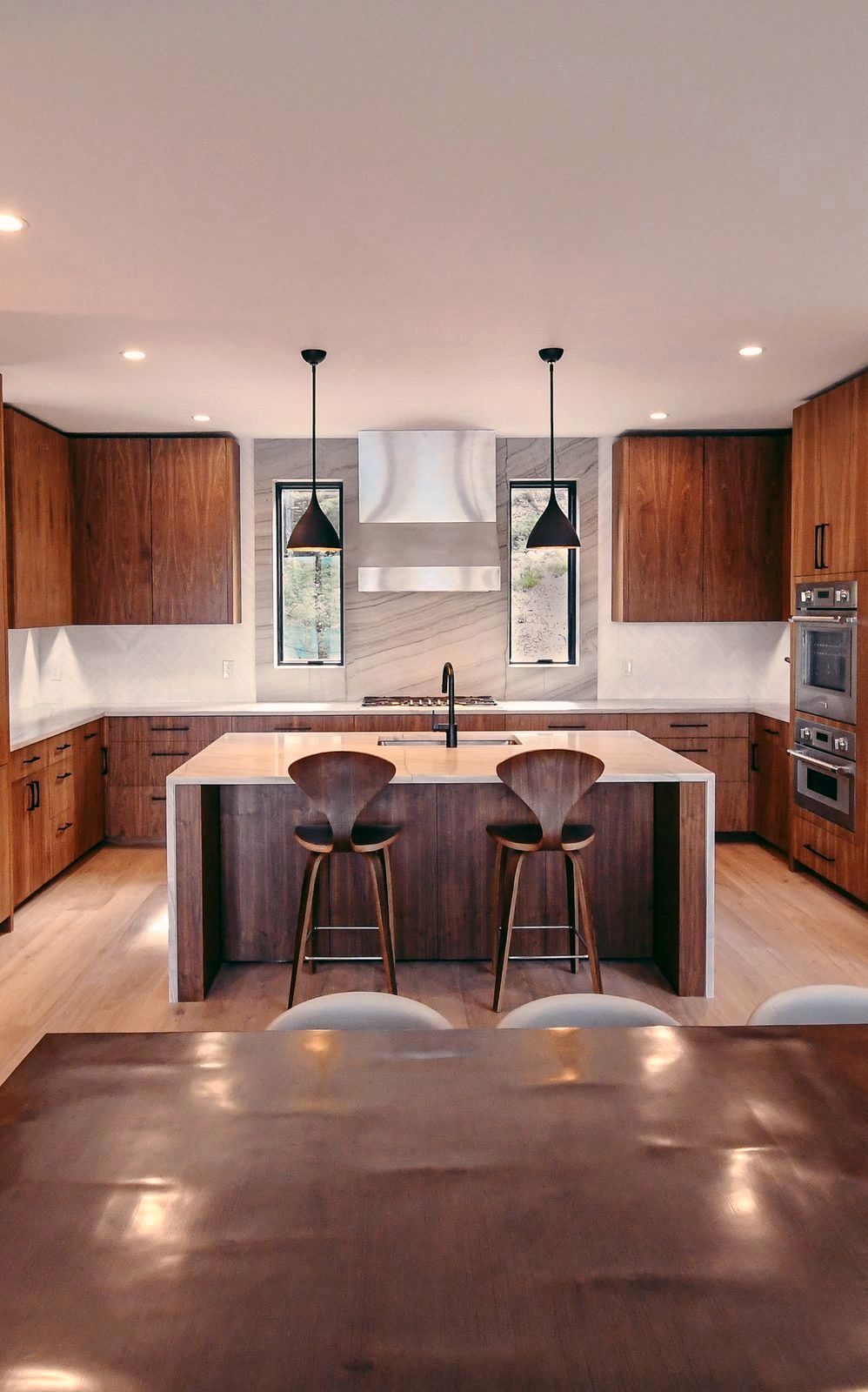 Walnut kitchen with waterfall island